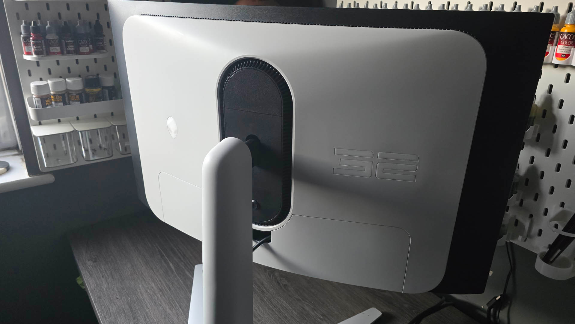 The Alienware AW3225QF QD-OLED monitor's rear on a desk