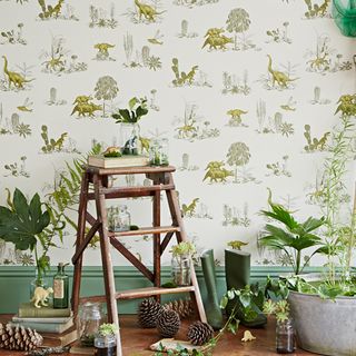 ladder with wallpaper on wall and plants