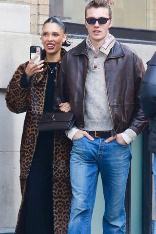 Nara Smith wearing a leopard-print coat with Lucky Blue Smith in NYC