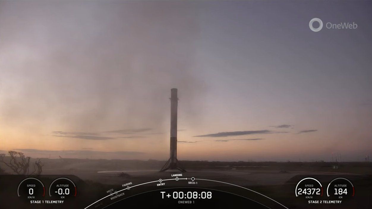 A SpaceX Falcon 9 rocket first stage is seen at Landing Zone 1 after a successful touchdown at the Cape Canaveral Space Force Station in Florida following the launch of 40 OneWeb internet satellites lifts off from the nearby Kennedy Space Center on Dec. 8, 2022.