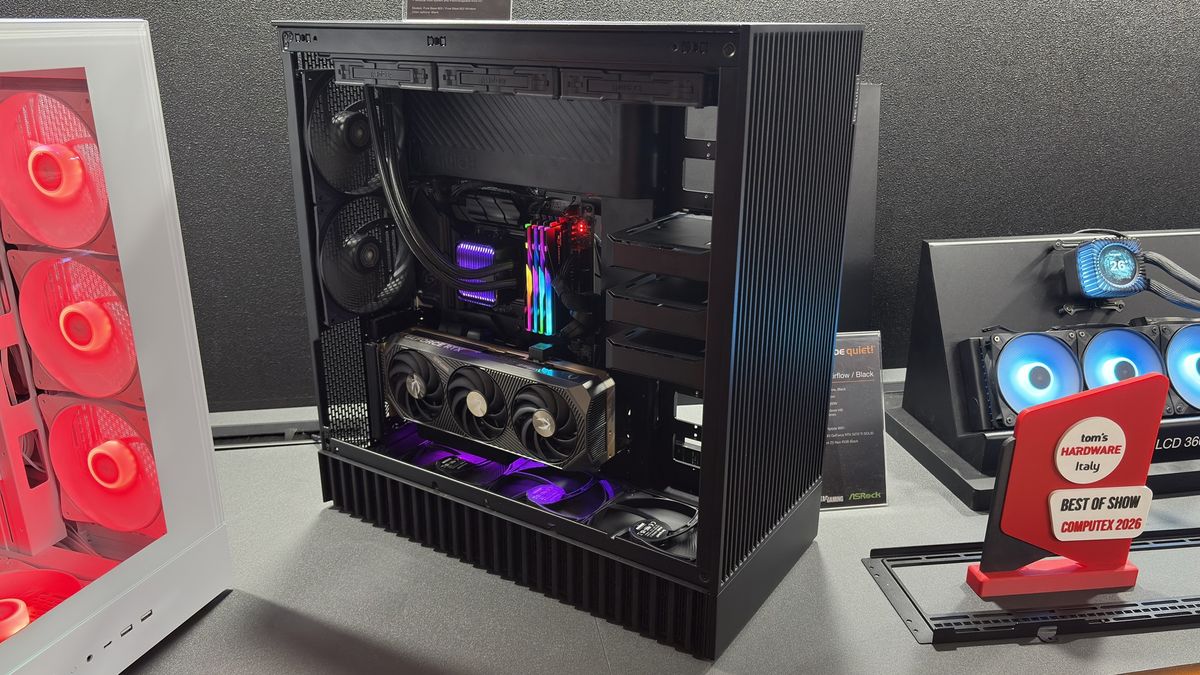 Be Quiet! Pure base 803 in black on a desk, beside the white version of the 803 LX