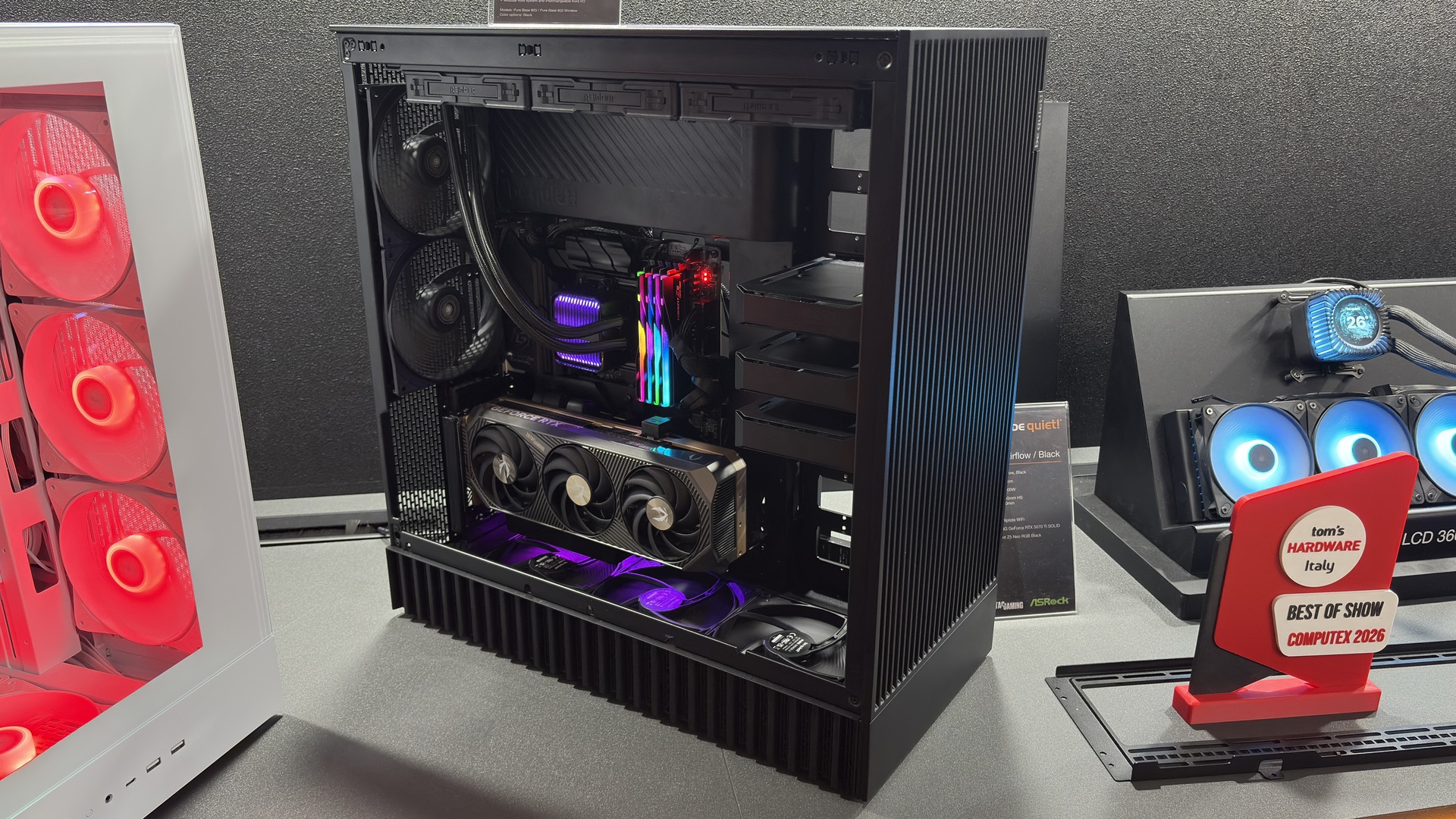 Be Quiet! Pure base 803 in black on a desk, beside the white version of the 803 LX