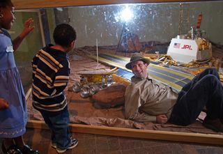"Earth in Human Hands" author David Grinspoon poses in a Mars Pathfinder display. Grinspoon is a co-investigator for the Mars Science Laboratory's Radiation Assessment Detector.