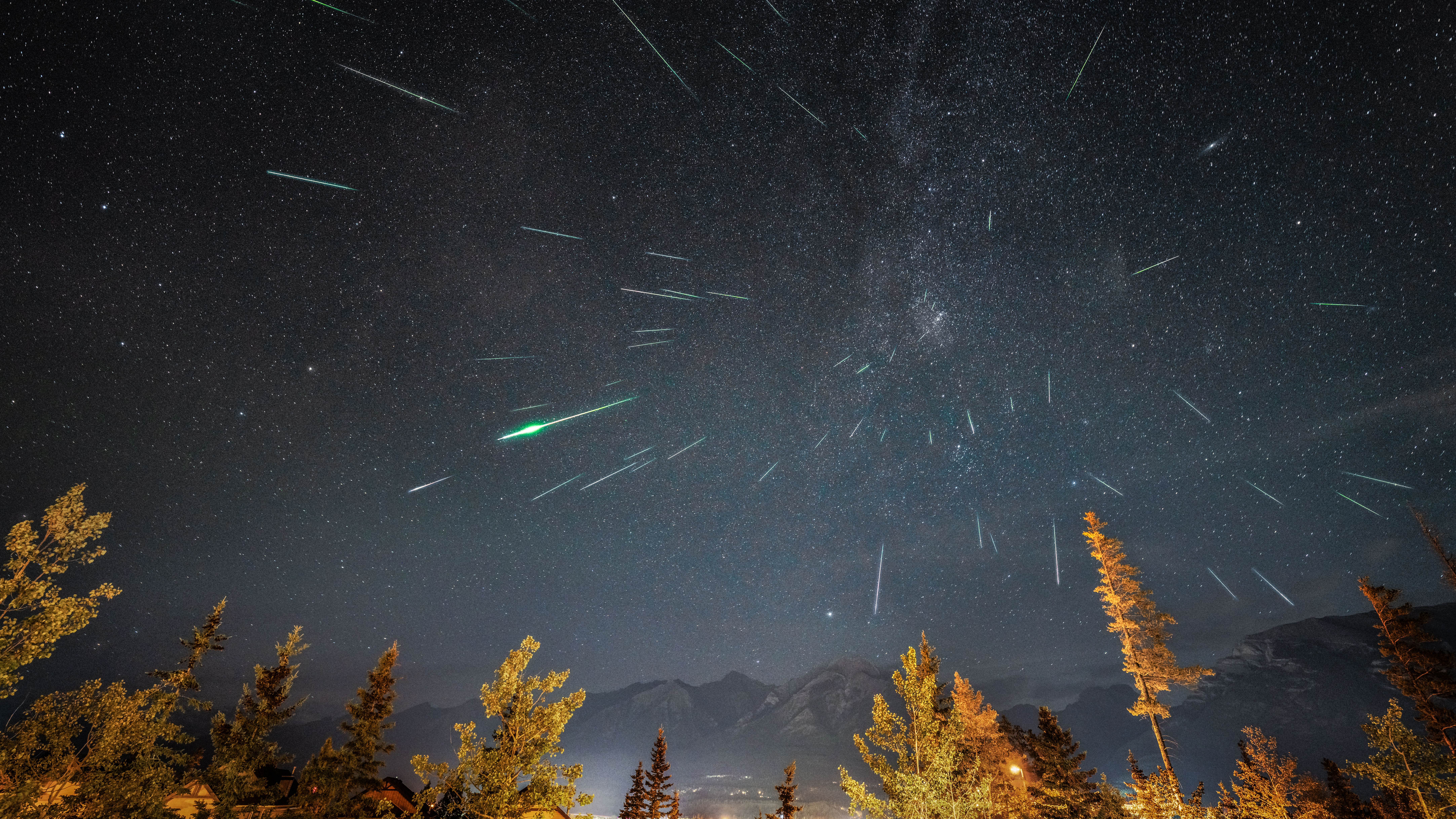 The Perseid meteor shower above Canmore in the Canadian Rockies, Alberta, Canada - stock photo