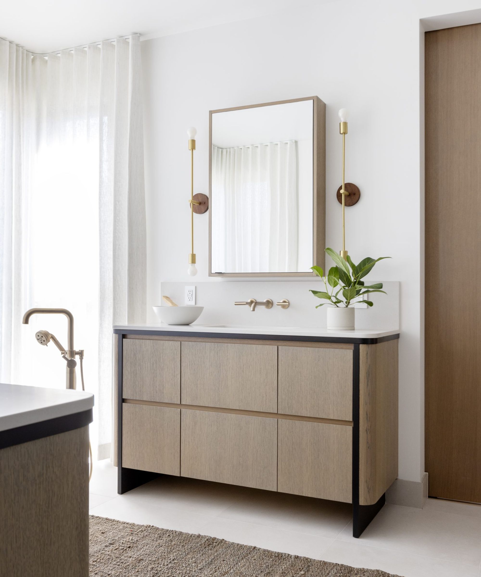 Neutral bathroom with wooden vanity
