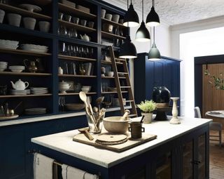 Open shelves in a farmhouse style kitchen by Neptune
