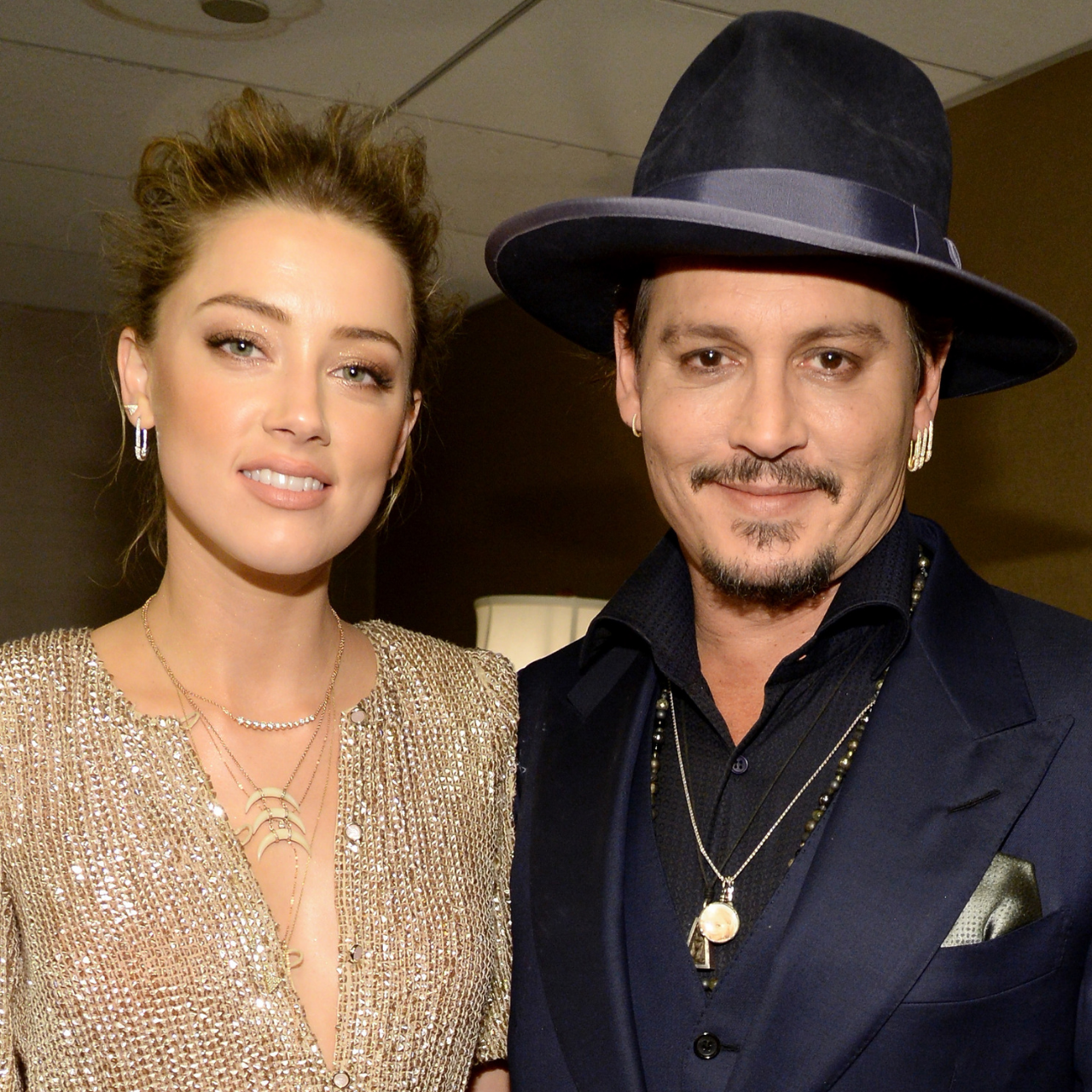 Amber Heard and Johnny Depp attend the 19th Annual Hollywood Film Awards 2015