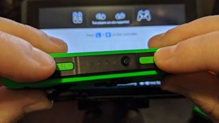 Pressing SL and SR buttons on half of a Joy-Con