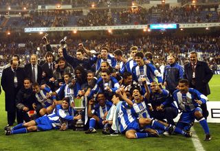 Deportivo La Coruña players and staff celebrate the club's Copa del Rey final win over Real Madrid in March 2002.