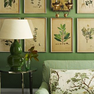 room with green wall and sofa