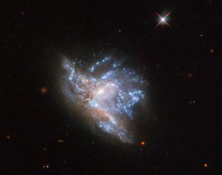 NGC 6052 galaxies crashing