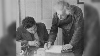 Albert Einstein stands with a student, circa 1945. The theoretical physicist was known to correspond with random people who wrote to him, according to researchers of a new study describing a letter he wrote to an engineer in the British Royal Navy.