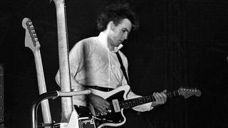 Robert Smith from The Cure performs live on stage at the Circus Tent in Het Park, Amsterdam, Netherlands on 27th June 1981.
