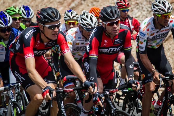 Michael Sch&auml;r (BMC) and teammate Cadel Evans have a discussion on the climb