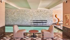 The spa at Downtown L.A. Proper features tiled floors and walls and a series of suggestive artworks, including paintings and sculptures.