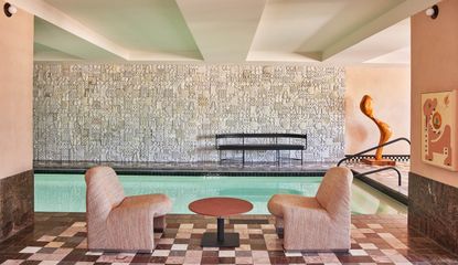 The spa at Downtown L.A. Proper features tiled floors and walls and a series of suggestive artworks, including paintings and sculptures.