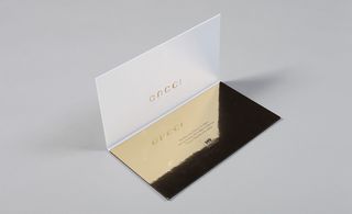 The reflection of the Gucci logo
