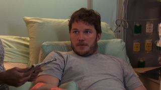 Chris Pratt as Andy Dwyer in hospital bed in Parks and Recreation