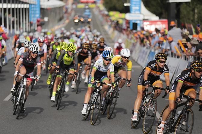 The peloton at the end of the finish straight