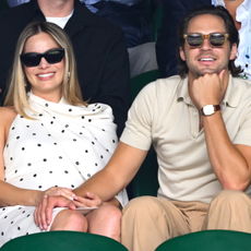 Margot Robbie and Tom Ackerley court-side of Centre Court on day twelve of the Wimbledon Tennis Championships at the All England Lawn Tennis and Croquet Club on July 12, 2024 in London, England