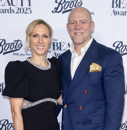 Zara Tindall wearing a black dress and Mike Tindall in a blue blazer at the Beauty Awards