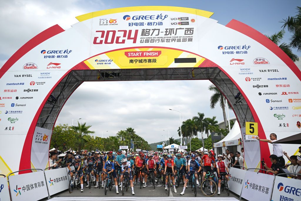 NANNING CHINA OCTOBER 20 LR Ethan Vernon of The United Kingdom and Team Israel Premier Tech Blue Points Jersey Pepijn Reinderink of The Netherlands and Team Soudal QuickStep Polka Dot Mountain Jersey Lennert Van Eetvelt of Belgium and Team Lotto Dstny Red Leader Jersey Chris Froome of The United Kingdom and Team Israel Premier Tech and a general view of the peloton prior to the 5th GreeTour of Guangxi 2024 Stage 6 a 134km stage from Nanning to Nanning UCIWT on October 20 2024 in Nanning China Photo by Dario BelingheriGetty Images