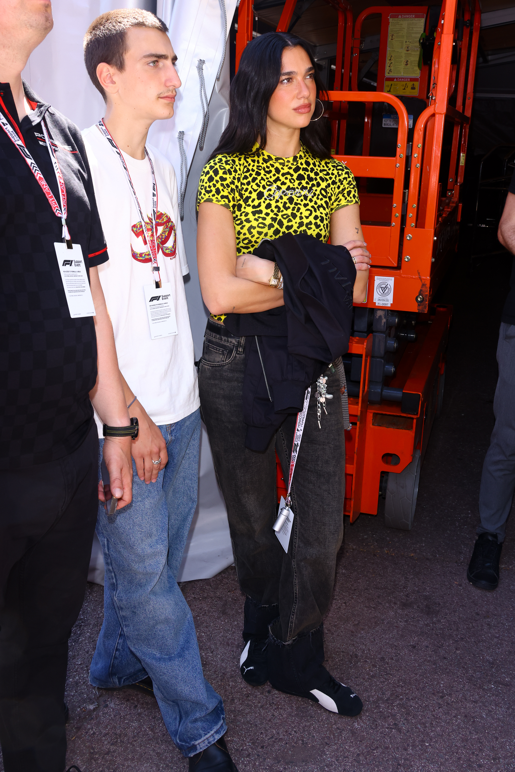 Dua Lipa attends the F1 Grand Prix in Monaco wearing Puma Speedcat OG Sneakers, Coperni boyfriend jeans and a leopard print top