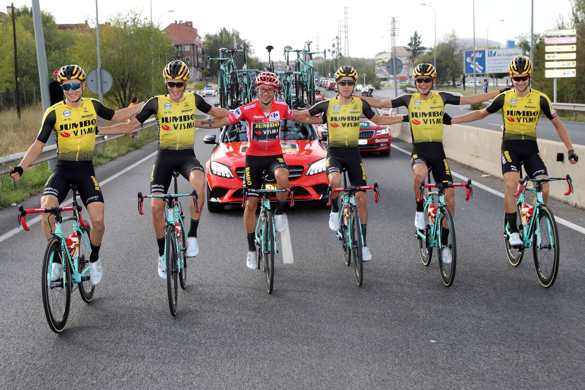 Jumbo Visma celebrate Roglic's win
