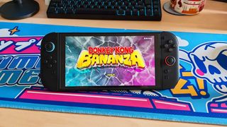 The Nintendo Switch 2 console on a desk running Donkey Kong Bananza
