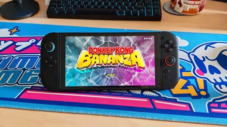 The Nintendo Switch 2 console on a desk running Donkey Kong Bananza