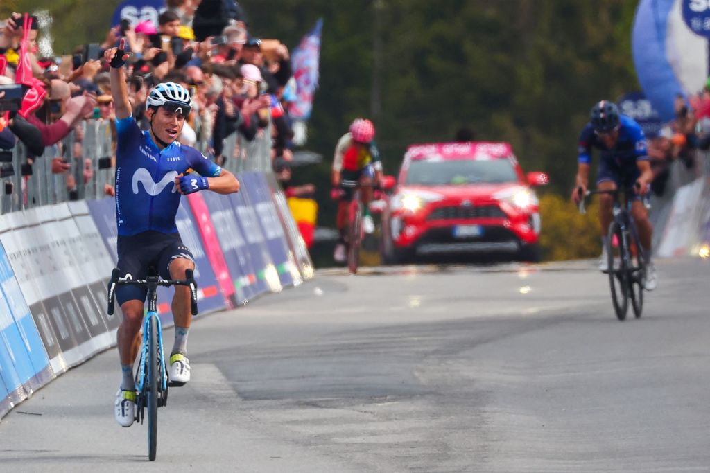 Movistar Teams Colombian rider Einer Rubio L celebrates as he arrives to cross the finish line ahead of Groupama FDJs French rider Thibaut Pinot Rear R and EF EducationEasyPosts Ecuadorian rider Jefferson Alexander Cepeda Rear C to win the thirteenth stage of the Giro dItalia 2023 cycling race which start was transfered from Borgofranco dIvrea to Le Chable in Switzerland due to bad weather conditions and CransMontana on May 19 2023 Photo by Luca Bettini AFP Photo by LUCA BETTINIAFP via Getty Images