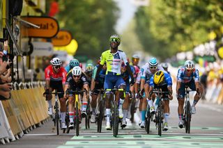 TORINO ITALY JULY 01 Biniam Girmay of Eritrea and Team Intermarche Wanty C celebrates at finish line as stage winner ahead of Fernando Gaviria of Colombia and Movistar Team Arnaud De Lie of Belgium and Team Lotto Dstny Dylan Groenewegen of Netherlands and Team Jayco AlUla Mads Pedersen of Denmark and Team Lidl Trek and Fabio Jakobsen of Netherlands and Team dsmfirmenich PostNL during the 111th Tour de France 2024 Stage 3 a 2308km stage from Piacenza to Torino UCIWT on July 01 2024 in Torino Italy Photo by Dario BelingheriGetty Images