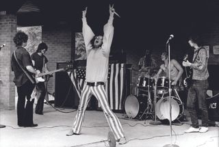 The rock group MC5 (L-R Wayne Kramer, Michael Davis, Rob Tyner, Dennis "Machine Gun" Thompson and Fred "Sonic" Smith) perform live at West Park in 1968 in Ann Arbor, Michigan.