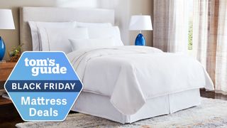 The Westin Heavenly Bed covered Westin pillows and bedding in a luxurious hotel room, a Tom&#039;s Guide Black Friday mattress deals graphic (left)