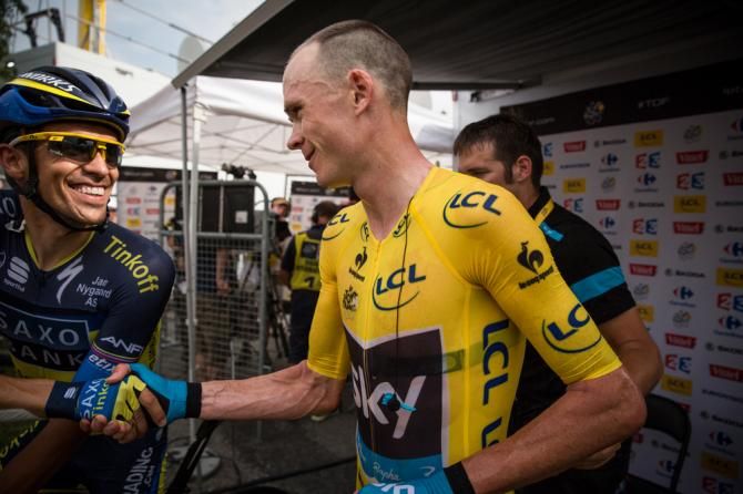 Former Tour de France winner Alberto Contador congratulates Froome on his win