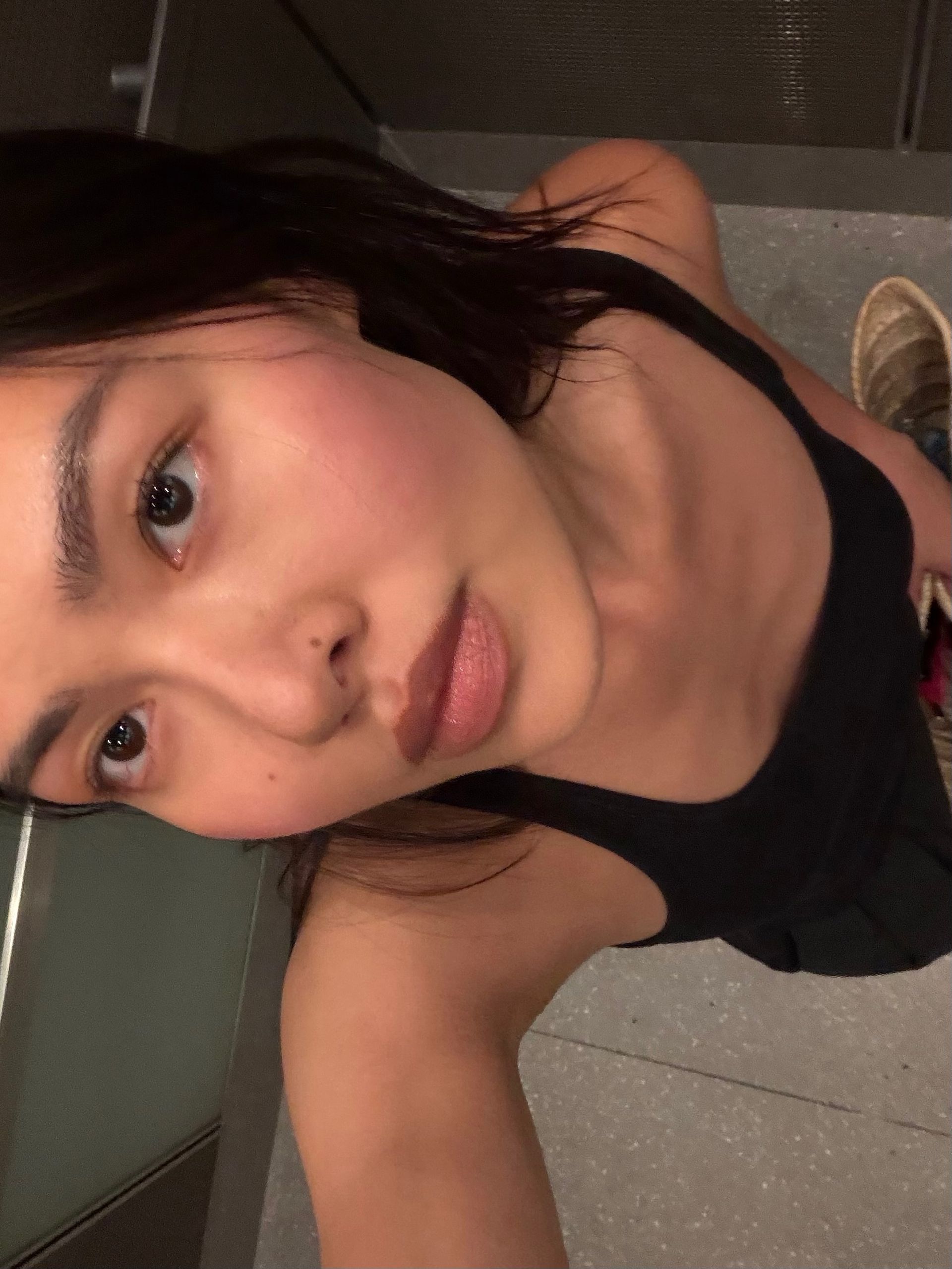 A woman with blushed cheeks.