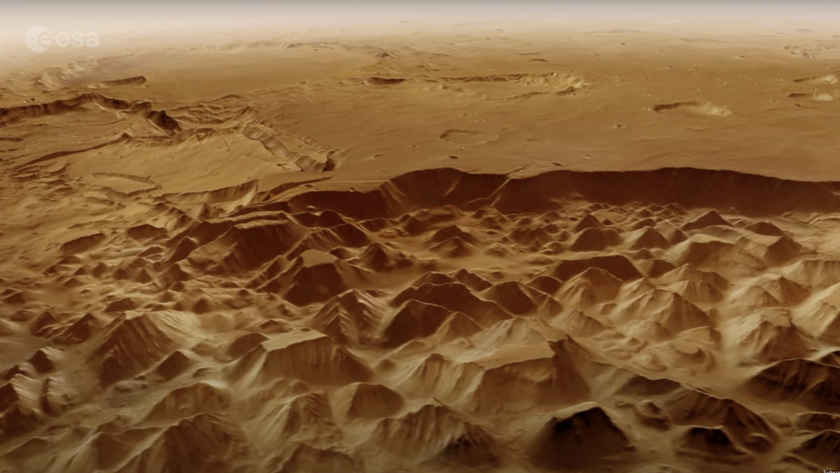 A computer-generated view of a canyon on Mars viewed from above