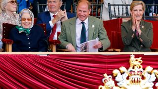 Queen Elizabeth II, accompanied by Prince Edward, Earl of Wessex and Sophie, Countess of Wessex, watches her horse 'Balmoral Leia'