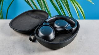 the JBL Tour One M2 headphones with black cups and a black exterior with bluetooth and 2.5mm jack connections