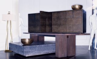 Left: 'Marcel' floor lamp; 'Marble Plinth' table; brass bowl, from a selection; 'Seagram' dining table; 'Smythson Shagreen' sideboard; bowl