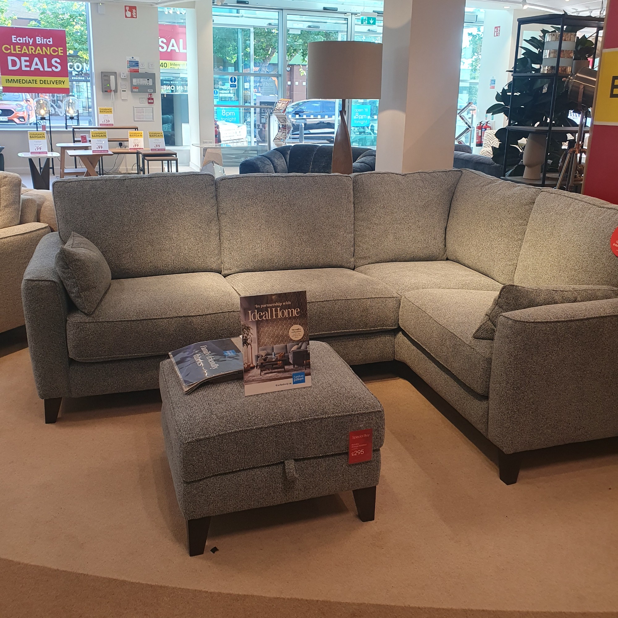 The Ideal Home Brondby sofa in blue at a Furniture Village store