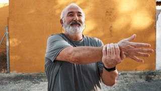 Coffee and lemon weight loss: Image shows man stretching