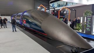 A mockup of a Hyperloop TT shuttle train at MWC 2023.