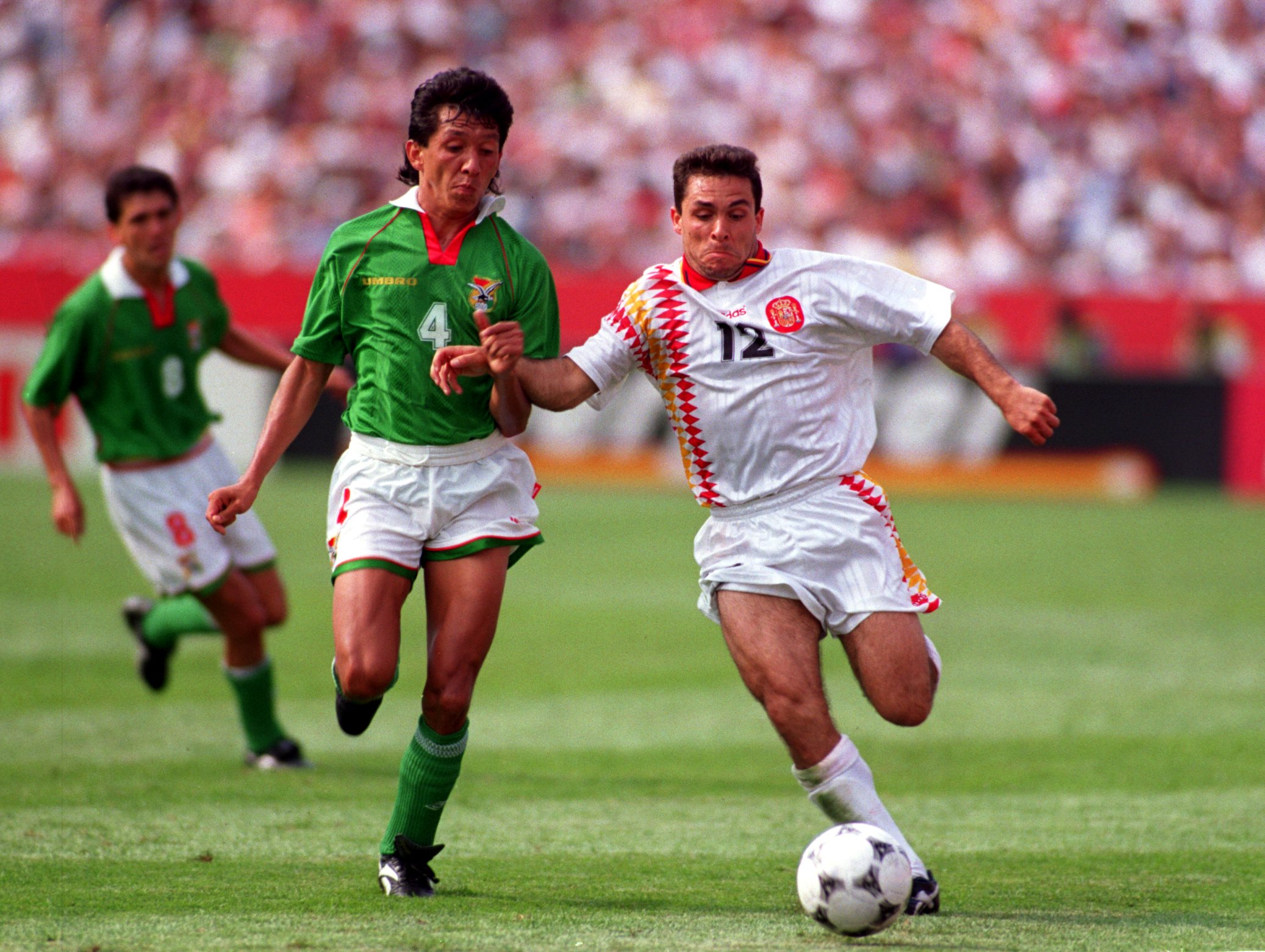 Spain's Sergi Barjuan (right) competes for the ball with Bolivia's Miguel Rimba at the 1994 World Cup.