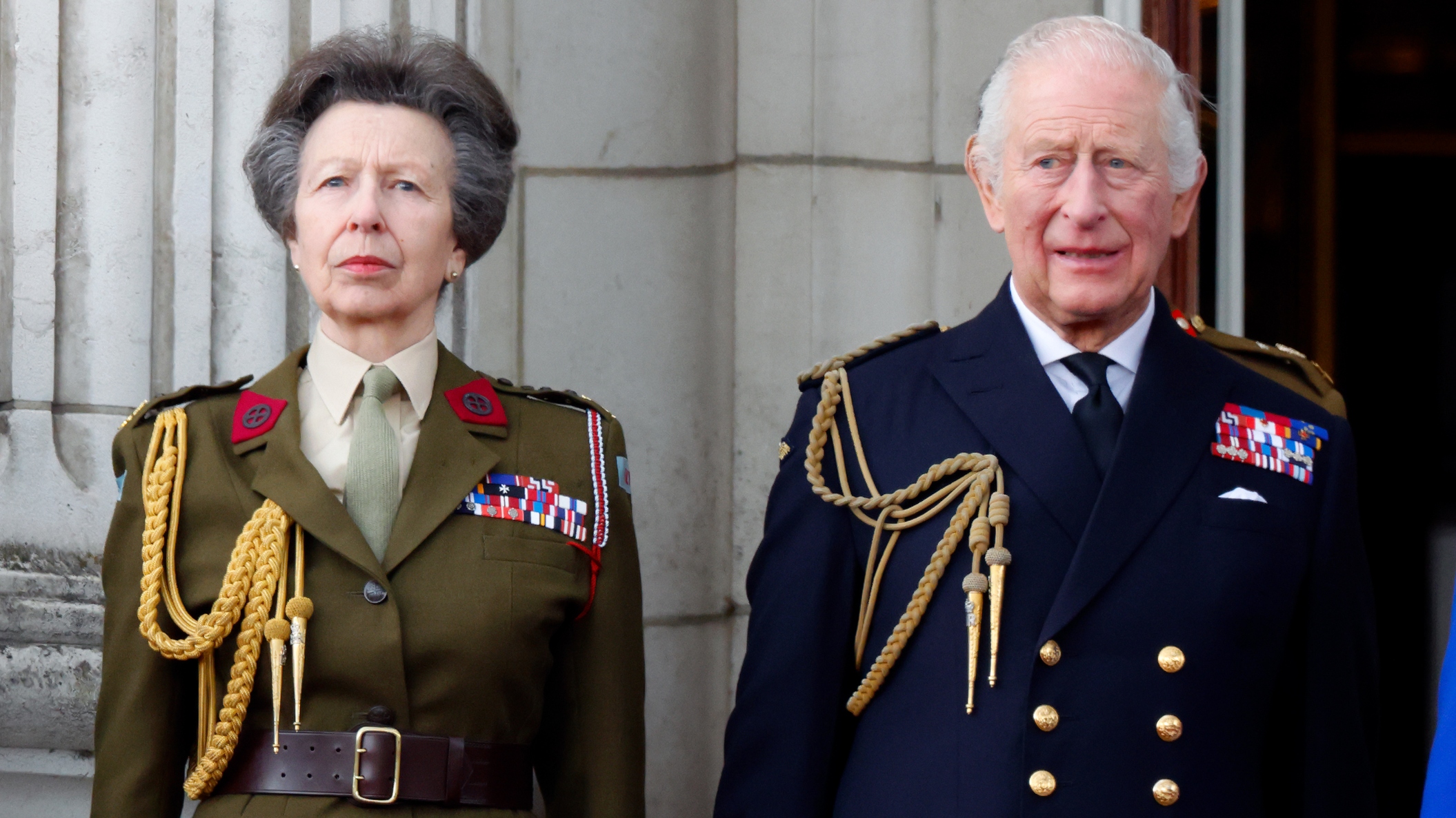 Princess Anne and King Charles III watch a flypast from the balcony of Buckingham Palace to mark the 80th anniversary of VE Day on May 5, 2025