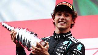 Race winner Andrea Kimi Antonelli of Italy and Mercedes AMG Petronas F1 Team on the podium with his trophy at the Grand Prix of Belgium at Circuit de Spa-Francorchamps on July 19, 2026 in Spa, Belgium