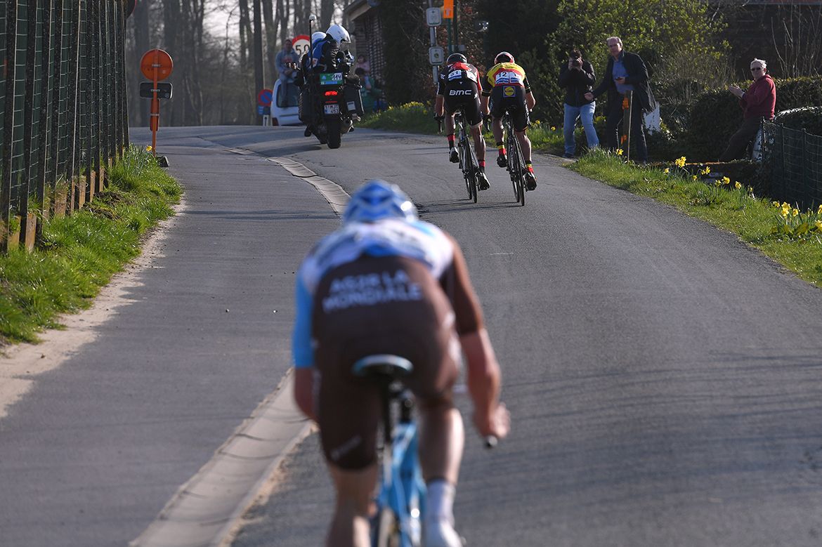 Oliver Naesen (AG2R La Mondiale) bridges back to Gilbert and Van Avermaet
