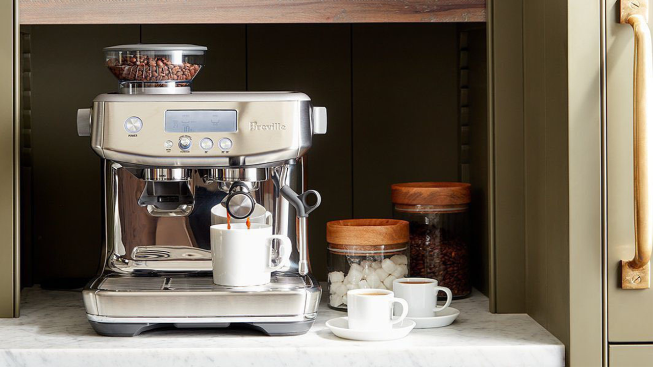 Crate &amp; Barrel&#039;s image of the Breville Barista Pro in a pantry nook