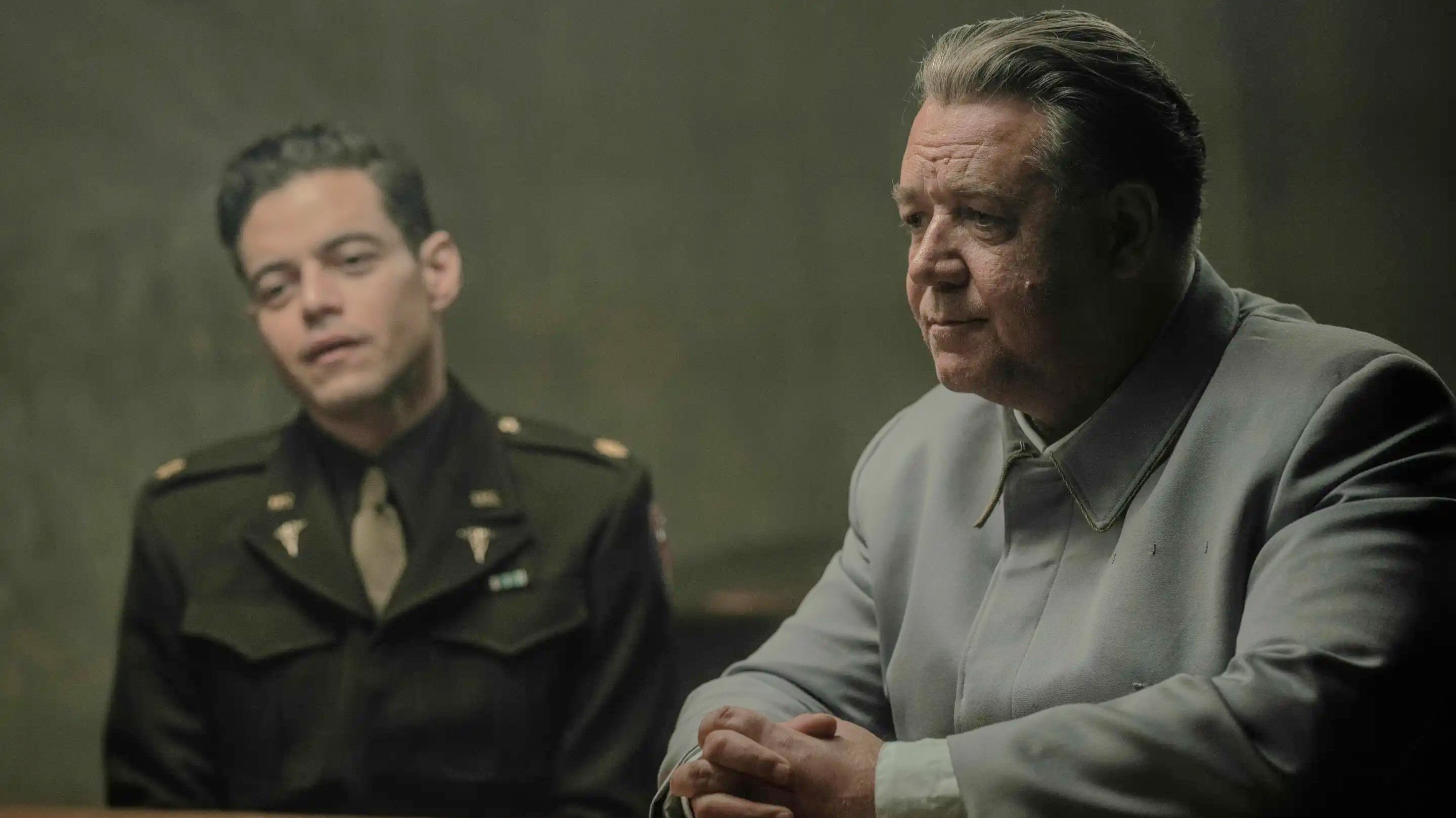 (L-R) Rami Malek as Douglas Kelley and Russell Crowe as Hermann G&amp;ouml;ring in &quot;Nuremberg&quot; (2025).