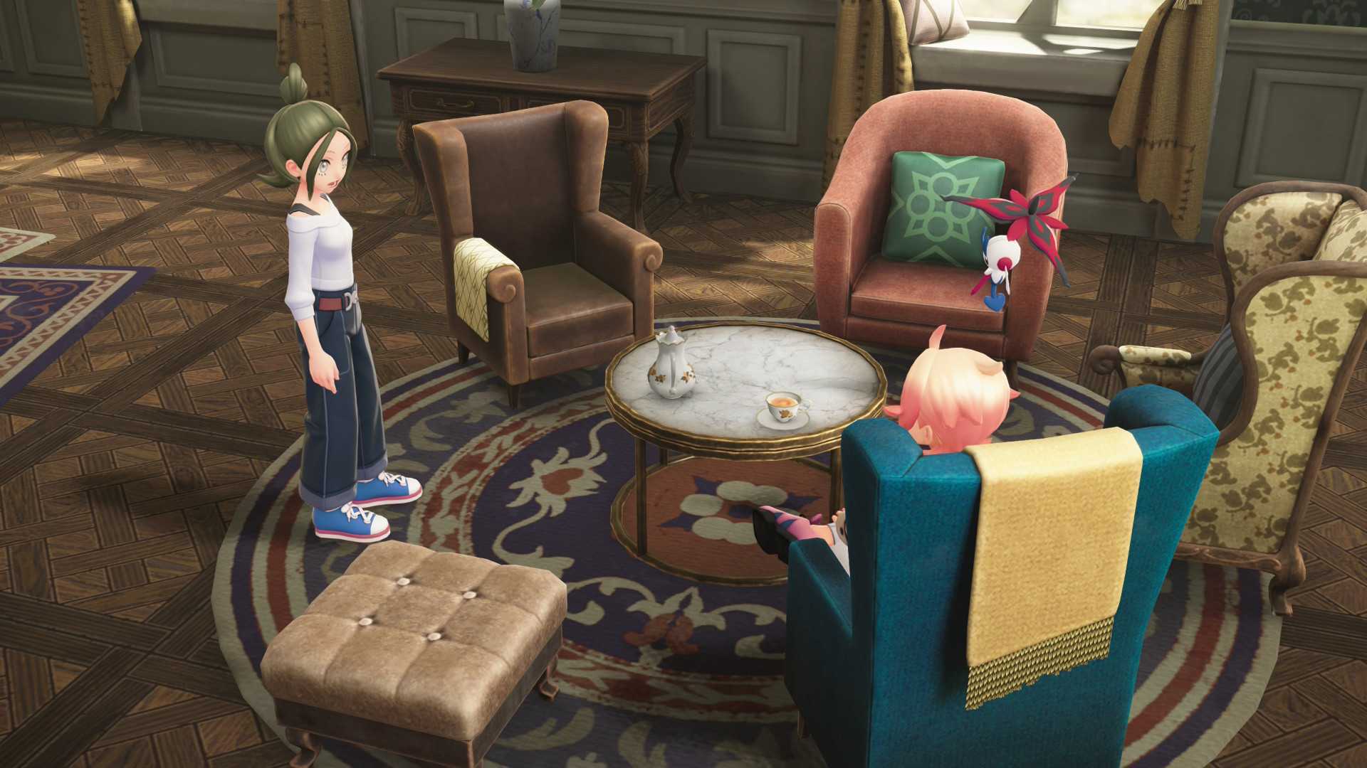 Trainers sit in a hotel lobby, with homely furniture, coffee tables and rugs